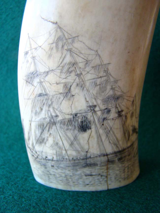 A 19th century scrimshawed whale's tooth featuring a ship listing or floundering — image 3